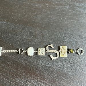Diesel 925 silver bracelet spelling out diesel. 7” long.